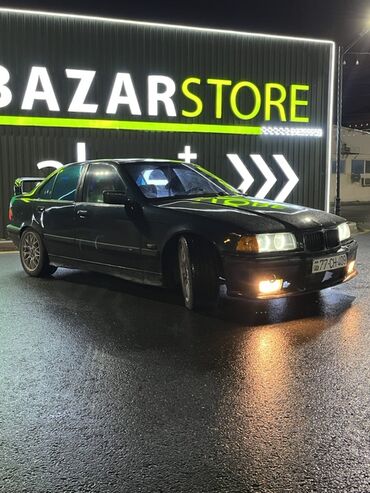 BMW: BMW 3 series: 1.8 l | 1996 il Sedan — 4