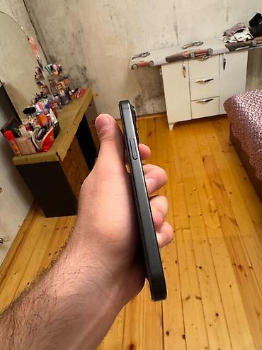 Apple iPhone: IPhone 15, 128 GB, Qara, Face ID — 4