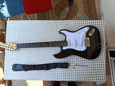 Gitaralar: Elektron gitara, 6 sim, İşlənmiş, Ünvandan götürmə — 3