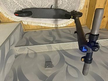 Elektrik nəqliyyatı: Ninebot elektrik skuter - Brend/model: Ninebot (gövdədə və displeydə — 1
