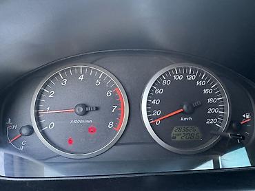 mazda 2: Mazda 2: 2006 г., 1.4 л, Механика, Газ, Хэтчбэк — 10