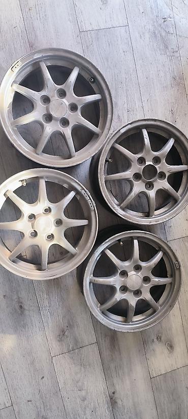Комплект из 4 оригинальных литых дисков Subaru. Основные at lalafo.kg Комплект из 4 оригинальных литых дисков Subaru. Основные
