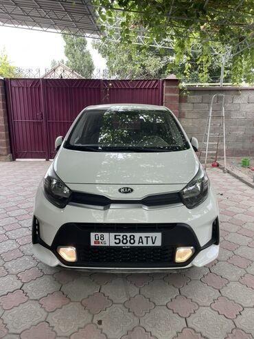мини электромобиль: Белый хэтчбек Kia Morning 2021год,Автомобиль оснащен передними