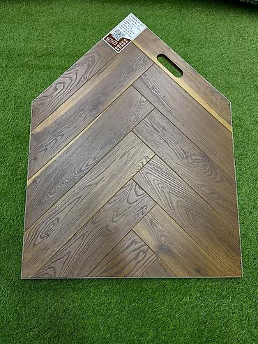 lamina: Laminat. 33 klass. Çin istehsalı. 12 MM qalınlıq. Suya qarşı davamlı — 4