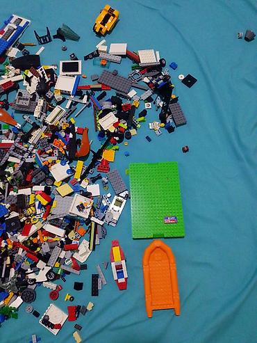 упаковшик керек: Большая смесь деталей LEGO в мягкой сумке-органайзере. - — 7