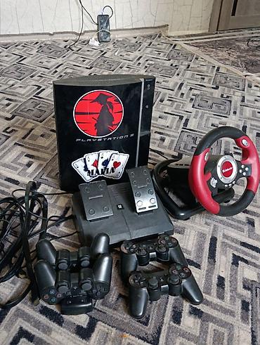 диски на playstation 3: PlayStation 3 с комплектом аксессуаров для гонок и кооператива. В — 1