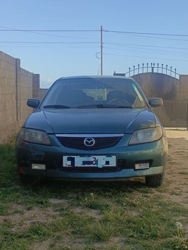 Mazda: Mazda 323: 2002 г., 1.6 л, Механика, Бензин, Хэтчбэк