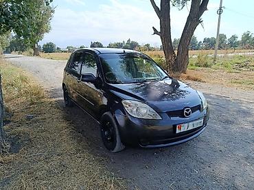 masda demio: Mazda Demio: 2005 г., 1.3 л, Автомат, Газ, Хэтчбэк — 5