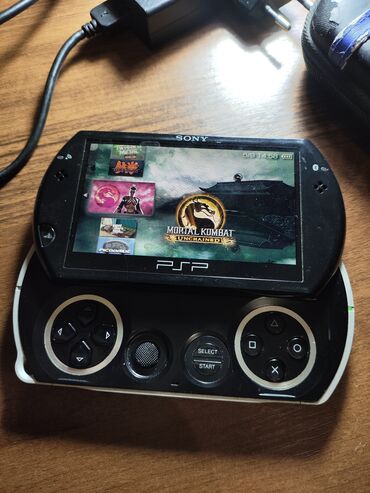 купить psp с играми: Продаю PSP go 
все работает 
чехол и зарядка в комплекте