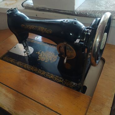 швейная машинка 4: Тигүүчү машина