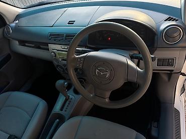 w211 e500: Mazda Demio: 2003 г., 1.5 л, Автомат, Бензин — 8