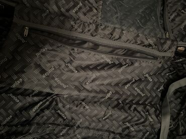 Çamadanlar: 2 defe istifade olunmus camadandir. Boyukdur ve cibleri coxdu sekilde — 9