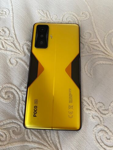 мобильные телефоны в кредит: Poco F4 GT, Колдонулган, 128 ГБ, түсү - Сары, 2 SIM