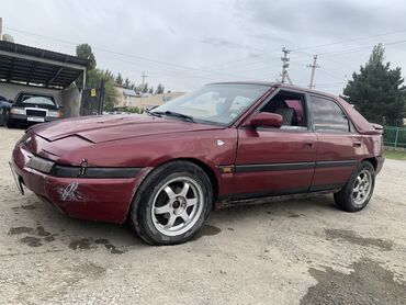 парок авто: Mazda 323: 1996 г., 1.6 л, Механика, Бензин, Хетчбек