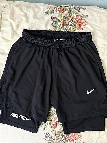 sabah forma satisi: Nike Pro idman şortu – kişi modeli, qara rəng. - İkiqat dizayn: üstdə — 1