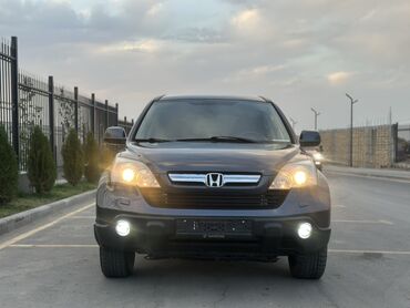 купить автомобиль honda cr v: Кроссовер Honda CR-V серого цвета. Модель оснащена галогенными фарами
