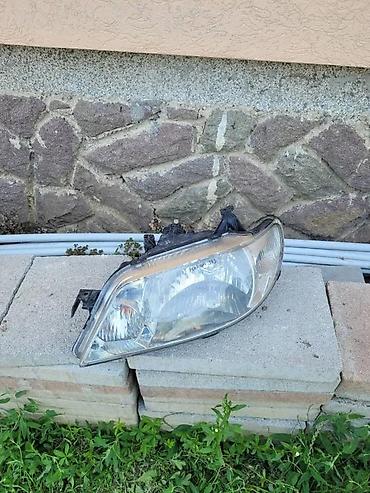 pezo 1: LEVI FAR MAZDA 323 | Levi far mazda 323 — 1