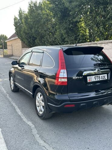купить двигатель д 245: Черный полноприводный кроссовер Honda CR-V, оснащенный бензиновым