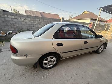 hozon neta l: Mazda 323: 1996 г., 1.5 л, Автомат, Бензин, Седан — 6