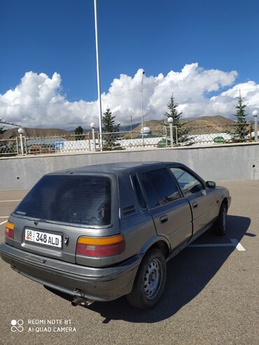 мазда 626 1 8: Toyota Corolla: 1987 г., 1.3 л, Механика, Бензин