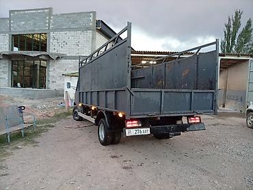 глушитель авто: Грузовой фургон Mercedes-Benz (рамный, задний привод) с бортовой — 8