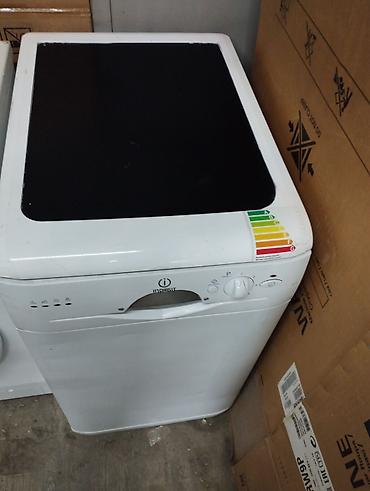 шкала: Посудомоечная машина Indesit (узкая, 44 см) - Компактный корпус — 1