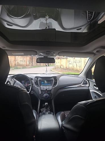 ford focus hatchback: Hyundai Santa Fe: 2 l | 2014 il Krossover — 7