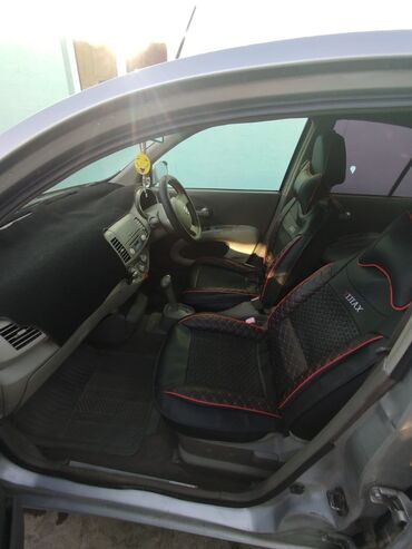 мото комбез: Nissan : 2003 г., 1.3 л, Автоматтык, Бензин, Хетчбек