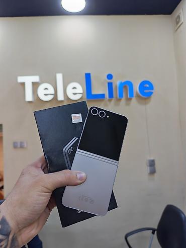 basofka qutusu: Samsung Galaxy Z Flip 6, 256 GB, rəng - Boz, Zəmanət, Barmaq izi, Simsiz şarj — 1