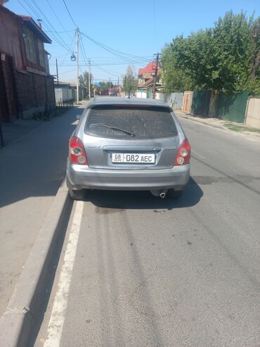 опель зафира б: Автомобиль Mazda Familia S-Wagon серого цвета, выполненный в кузове