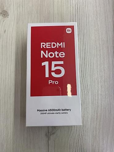 poco s40: Смартфон Xiaomi Redmi Note 15 Pro в чёрном цвете. На коробке указана — 1