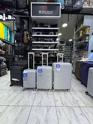 Çamadanlar: Sərt korpuslu səyahət çamadan dəsti - Material: Yüngül və davamlı — 1