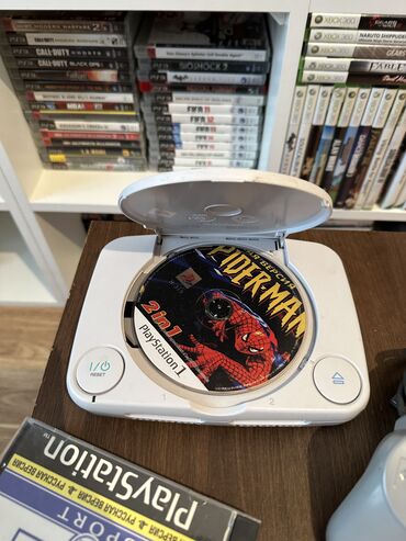 1 mənzil sataram: Playstation 1 Slim 7+ disklə verilir (çipli) 1 original joysticklə