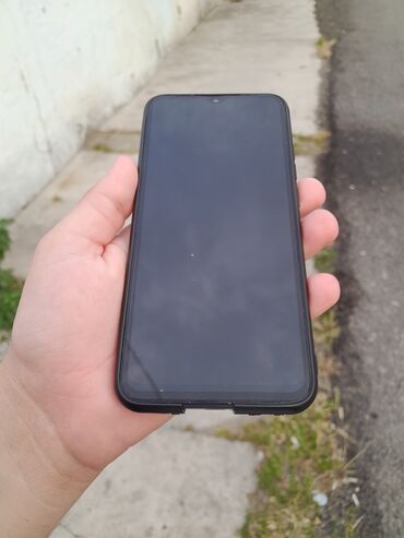 сотовый телефон fly ezzy: Xiaomi Redmi 9A, 32 ГБ, цвет - Черный, 
 Сенсорный, Две SIM карты