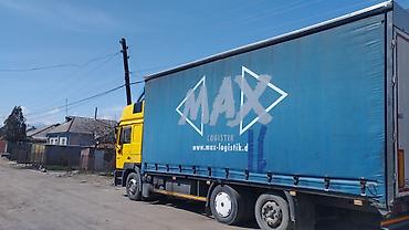 транс: Тентованный грузовик MAN с боковой и верхней загрузкой - — 4