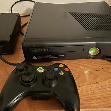 iphone 15 por: Xbox 360 oyun konsolu (Slim model) Xüsusiyyətlər: - Qara rəngli Xbox — 1