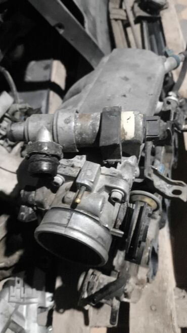 Панели, обшивки: - МКПП (механическая коробка передач) в сборе с кулисой/приводом — 11