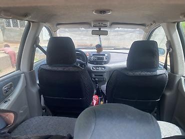 Nissan Tino: 2002 г., 2.2 л, Кол менен иштөөчү, Дизель, Вэн/Минивэн — 1
