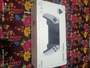 Другие портативные консоли: Продаю Игровой консоль M25 внутри очень много игры, как Tekken, Mortal — 2