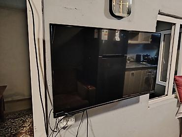 gen: Televizor – böyük ekranlı LED TV - Ekran ölçüsü: təxminən 55–60 düym — 2