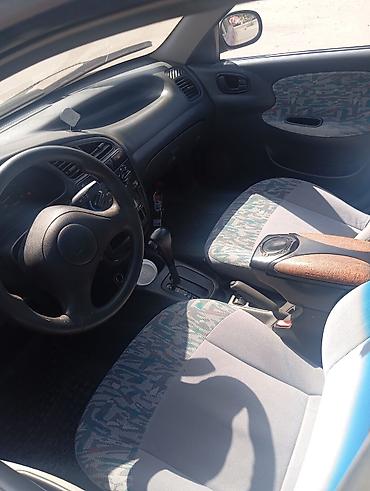 даево матиз 1: Daewoo Lanos: 1997 г., Кол менен иштөөчү, Бензин, Седан — 5