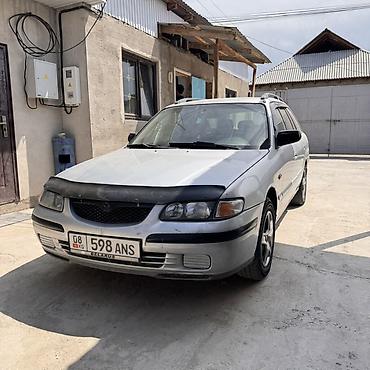 g comp: Mazda 626: 1999 г., 1.8 л, Механика, Бензин, Универсал — 1