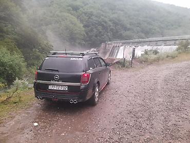 şevralit avtomobil: Opel Astra: 1.3 l | 2006 il Universal — 4