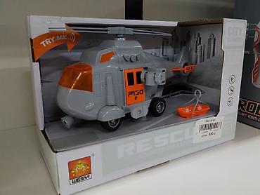 Игрушечный вертолёт WENYI Rescue P130. Модель выполнена в стиле