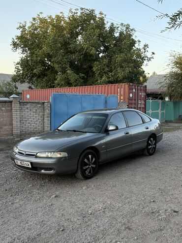 перевозной дом: Mazda Cronos: 1992 г., 2 л, Механика, Газ, Седан