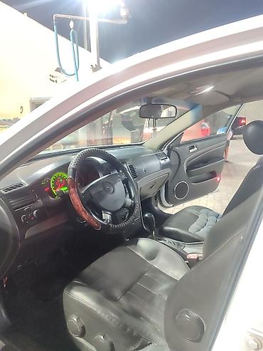 gac aion i60: Chevrolet Epica: 2010 г., 2 л, Автомат, Газ, Седан — 3