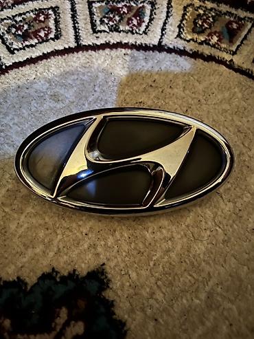 hyundai emblem: Hyundai arxa bagaj üçün emblem (loga) duyme 2020-2023 - Forma: oval - — 2