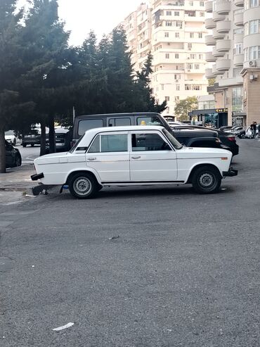 VAZ (LADA): VAZ 2106 sedan, ağ rəng. Klassik kuzov, 4 qapı, arxa ötürücülü. Ön və — 6