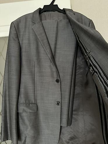 Костюмы: Классические мужские пиджаки темных оттенков. Цены начинаются от — 6