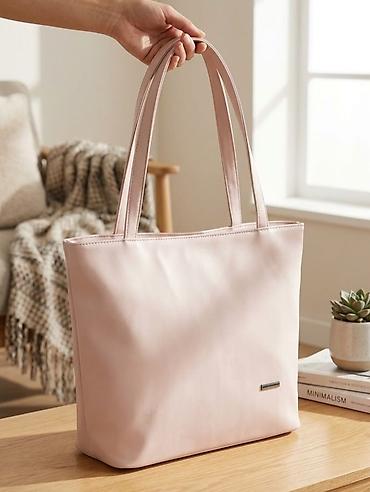 imani torbe: Elegantna ženska tote torba u svetloružičastoj boji. - Materijal — 1